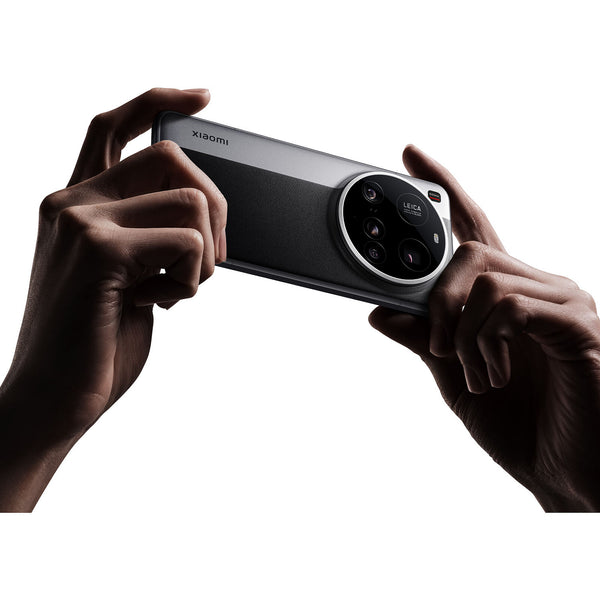 Hand holding a Xiaomi 15 ultra smartphone with a white background